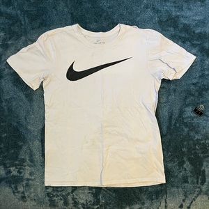 Small nike t shirt big black center swoosh
